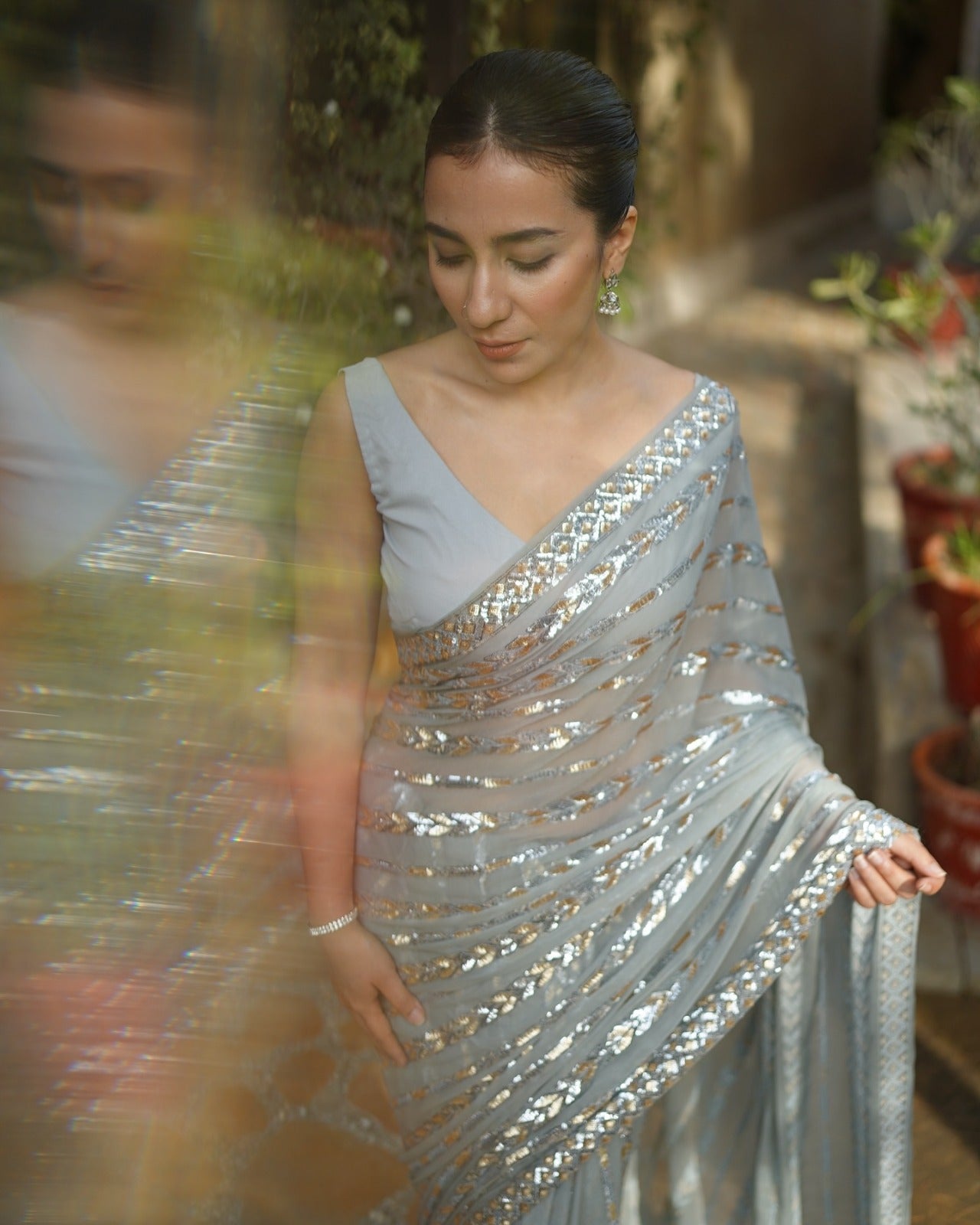 Classic and elegant grey georgette saree with sequence work & lace with unstitched blouse