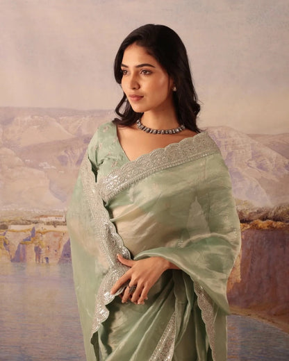 Elegant Pastel Green Silk Blend Saree with Embellished Border & Unstitched Blouse