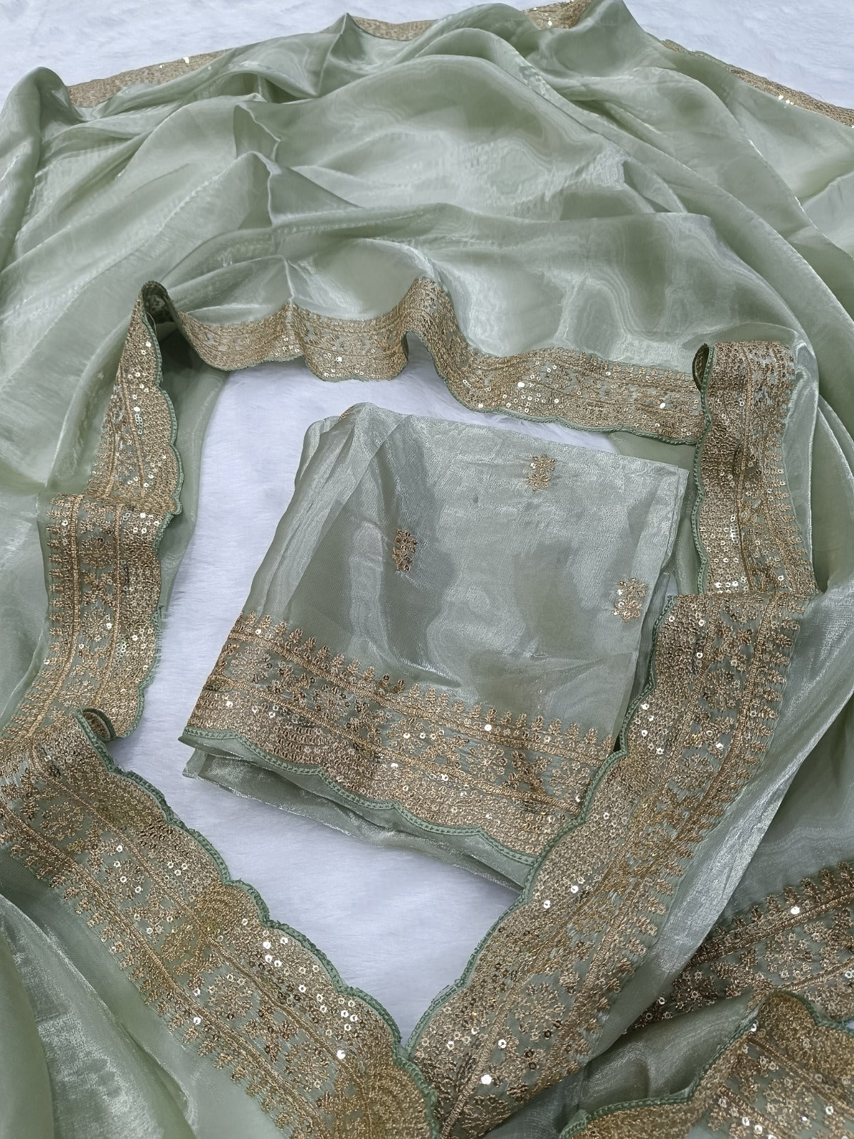 Elegant Pastel Green Silk Blend Saree with Embellished Border & Unstitched Blouse