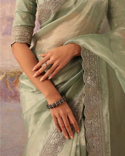 Elegant Pastel Green Silk Blend Saree with Embellished Border & Unstitched Blouse